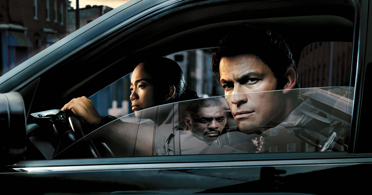 پوستر سریال The Wire با نمای شهری بالتیمور و حال‌وهوای جنایی